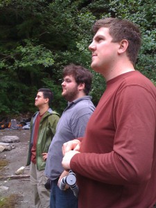 The guys looking up towards the falls